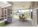 Inviting screened porch with dining set, perfect for outdoor meals and relaxing at 1417 Roustabout Way, Charleston, SC 29414