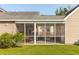 Enclosed screened porch with outdoor seating, offering a relaxing outdoor living space at 1417 Roustabout Way, Charleston, SC 29414