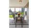 Comfortable screened porch with a table and seating for outdoor dining and relaxation at 1417 Roustabout Way, Charleston, SC 29414