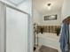 Bright bathroom featuring a soaking tub and a shower with sliding glass doors at 158 Whippoorwill Dr, Summerville, SC 29483