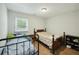 Comfortable bedroom with twin beds, a window with blinds, and a calm, inviting atmosphere for relaxation at 158 Whippoorwill Dr, Summerville, SC 29483