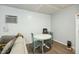 Compact dining area with a white table and 2 green chairs at 158 Whippoorwill Dr, Summerville, SC 29483