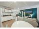 Open-concept with a kitchenette and living area with a tv at 158 Whippoorwill Dr, Summerville, SC 29483