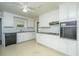Bright kitchen featuring white cabinets, ample counter space, and modern appliances at 1707 Sharon Ave, Charleston, SC 29407