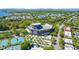 Aerial view showcasing a stadium, tennis courts, and surrounding city landscape at 187 Ithecaw Creek St, Daniel Island, SC 29492