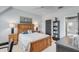 Bedroom featuring wooden bed frame and nautical decor at 187 Ithecaw Creek St, Daniel Island, SC 29492