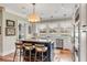 Bright open kitchen featuring a center island, modern appliances, and lots of natural light at 187 Ithecaw Creek St, Daniel Island, SC 29492