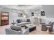 Comfortable living room with a plush sofa and patterned chairs at 187 Ithecaw Creek St, Daniel Island, SC 29492