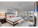 Spacious primary bedroom with a fireplace and a view of the outside at 187 Ithecaw Creek St, Daniel Island, SC 29492
