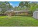 Well-maintained brick home featuring a covered patio and a spacious backyard at 204 Pointer Dr, Summerville, SC 29485