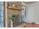 Stunning stone fireplace with a wooden mantel adding character to this comfortable room at 204 Pointer Dr, Summerville, SC 29485