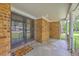 Welcoming front porch with brick columns and a screened front door at 204 Pointer Dr, Summerville, SC 29485