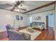 Comfortable living room featuring hardwood floors, ceiling fan, neutral paint, and a seating area for relaxing at 204 Pointer Dr, Summerville, SC 29485