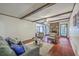 Spacious living room with hardwood floors, a stone fireplace, and lots of natural light at 204 Pointer Dr, Summerville, SC 29485