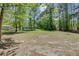 Large backyard with a shed, offering ample space and potential for various outdoor activities and landscaping projects at 209 Cheyenne Rd, Summerville, SC 29483