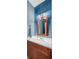 Chic bathroom with stylish vanity, decorative mirror, and elegant lighting fixtures at 209 Cheyenne Rd, Summerville, SC 29483
