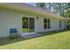 Home exterior featuring sliding glass doors to the backyard, connecting indoor and outdoor living spaces at 209 Cheyenne Rd, Summerville, SC 29483