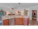 Open kitchen layout with breakfast bar, stainless steel appliances, and ample cabinet space at 209 Cheyenne Rd, Summerville, SC 29483