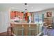 Bright kitchen featuring bar seating, modern appliances, and granite countertops at 209 Cheyenne Rd, Summerville, SC 29483
