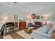 Cozy living room featuring comfortable seating, rustic decor, and a decorative accent rug at 209 Cheyenne Rd, Summerville, SC 29483