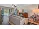 Comfortable living room with open dining and kitchen area, with access to the backyard at 209 Cheyenne Rd, Summerville, SC 29483