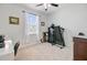 Bedroom featuring neutral carpeting, a ceiling fan, and a window overlooking the exterior at 212 Rubles Ln, Moncks Corner, SC 29461