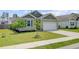 Charming single-story home featuring a well-maintained lawn and attached two-car garage at 212 Rubles Ln, Moncks Corner, SC 29461
