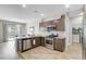 Modern kitchen features stainless steel appliances, granite countertops, and wood-look flooring at 212 Rubles Ln, Moncks Corner, SC 29461
