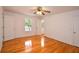 Spacious bedroom with hardwood flooring, two windows and two closets at 2300 Bethera Rd # A, Bonneau, SC 29431