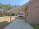 Covered brick patio offers an ideal outdoor space for relaxation or entertainment at 2300 Bethera Rd # A, Bonneau, SC 29431