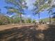 Long view of home from back of lot in shady yard at 2300 Bethera Rd # A, Bonneau, SC 29431