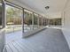 Inviting screened porch with a view of the outdoors, perfect for relaxation and enjoying the scenery at 2300 Bethera Rd # A, Bonneau, SC 29431