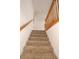 Carpeted staircase leads to upper level, offering a comfortable and classic touch at 2300 Bethera Rd # A, Bonneau, SC 29431