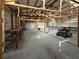 Large storage building with a work bench and lawn mower at 2300 Bethera Rd # A, Bonneau, SC 29431