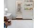 Bright bedroom featuring bookshelves with reading material and a teddy bear at 2372 Darts Cove Way, Mount Pleasant, SC 29466