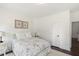 Comfortable bedroom with minimalist decor, complemented by soft lighting and peaceful surroundings at 2372 Darts Cove Way, Mount Pleasant, SC 29466