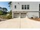 Two-car garage with an extra-wide driveway and a side entrance at 2372 Darts Cove Way, Mount Pleasant, SC 29466