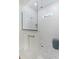 Walk-in shower featuring white subway tile, glass enclosure and hexagonal mosaic tile floor at 2372 Darts Cove Way, Mount Pleasant, SC 29466