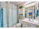 Clean bathroom with shower and tub, vanity, and ample storage space for toiletries at 2427 Stingray Blvd, North Charleston, SC 29406