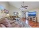 Spacious living room with vaulted ceiling, hardwood floors, and comfortable seating arrangements at 2427 Stingray Blvd, North Charleston, SC 29406