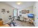 Multipurpose room with desk, exercise bike, and tile floors for an active lifestyle at 2427 Stingray Blvd, North Charleston, SC 29406