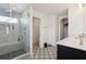 Bathroom boasts a glass shower with tile surround, decorative tile floor and vanity sink at 247 Godwit Dr, Summerville, SC 29486