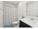 Bright bathroom featuring a shower with striped curtain and a modern vanity with a framed mirror at 247 Godwit Dr, Summerville, SC 29486