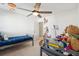 Bedroom features two beds, a ceiling fan, and wall decor at 247 Godwit Dr, Summerville, SC 29486