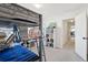 Bedroom features a bunk bed, a basketball hoop on the wall, and a view of the hallway at 247 Godwit Dr, Summerville, SC 29486