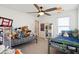 Bedroom features two beds, a ceiling fan, and a window with natural light at 247 Godwit Dr, Summerville, SC 29486