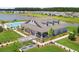 Beautiful clubhouse with outdoor pool overlooking community lake and manicured lawns at 247 Godwit Dr, Summerville, SC 29486