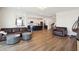 Open concept living room flowing into the kitchen with a large island and barstool seating at 247 Godwit Dr, Summerville, SC 29486