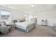 Bright main bedroom features soft carpet, tray ceilings, decor and natural light from windows at 247 Godwit Dr, Summerville, SC 29486