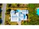 Bird's-eye view of an estate showcasing its unique architectural design, pool, and landscaping at 2870 Ion Ave, Sullivans Island, SC 29482